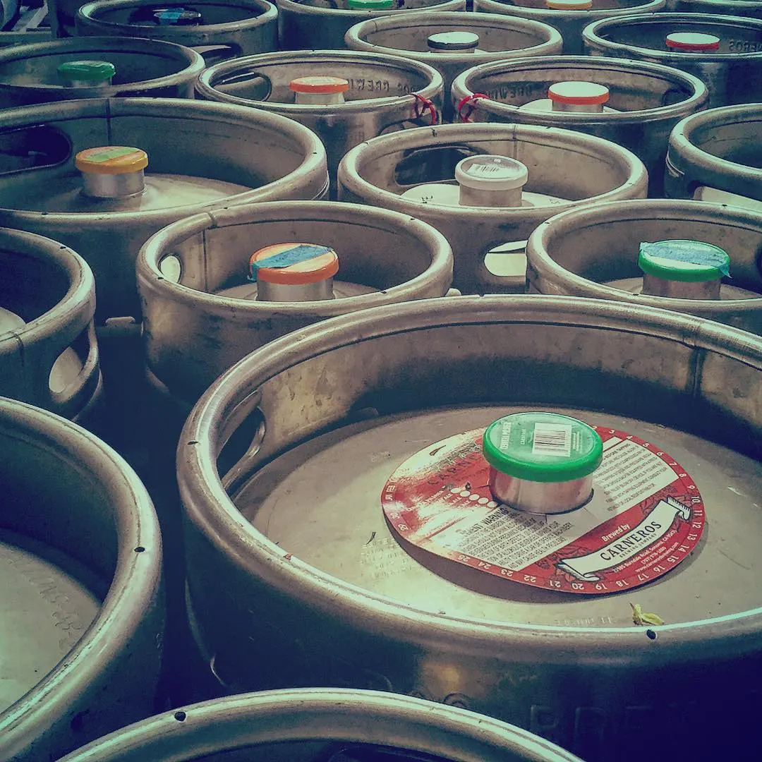 Archive photograph of kegs stacked at Carneros Brewing · 2016