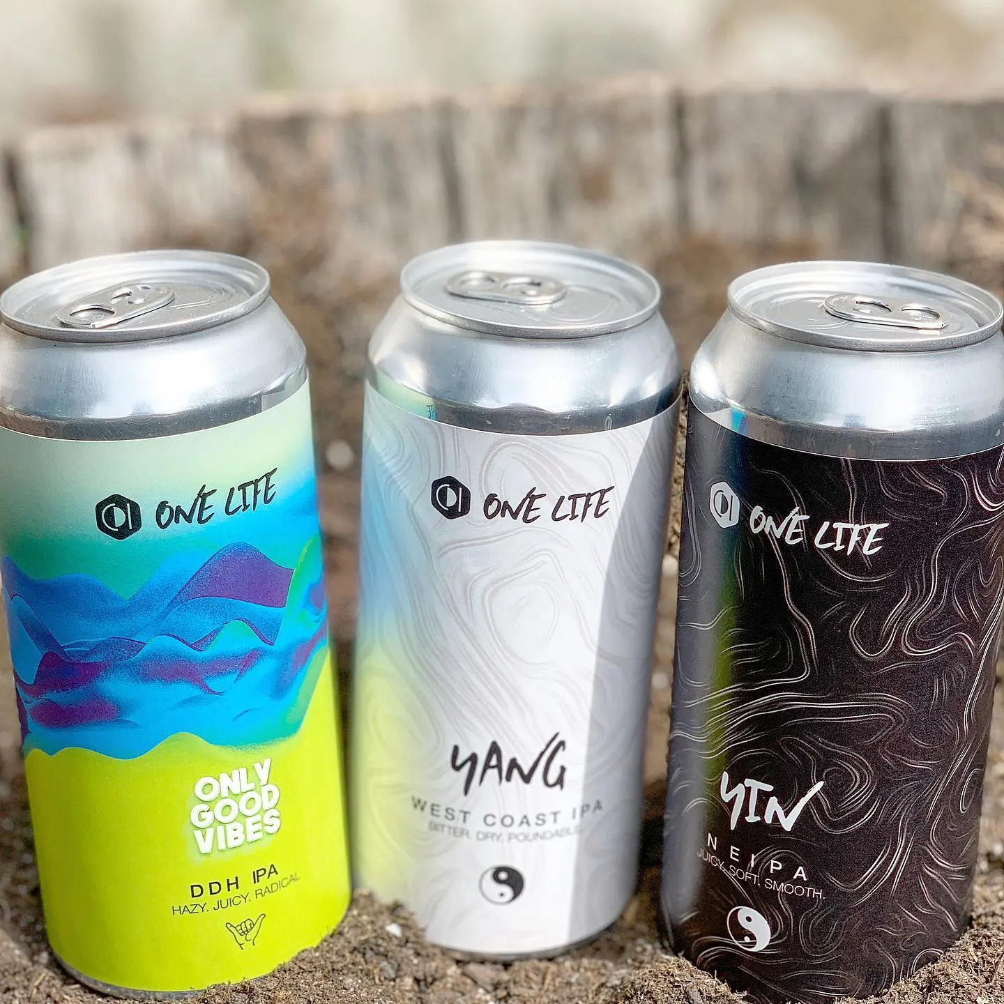 Archive photograph of the three original One Life cans that reached France · 2019